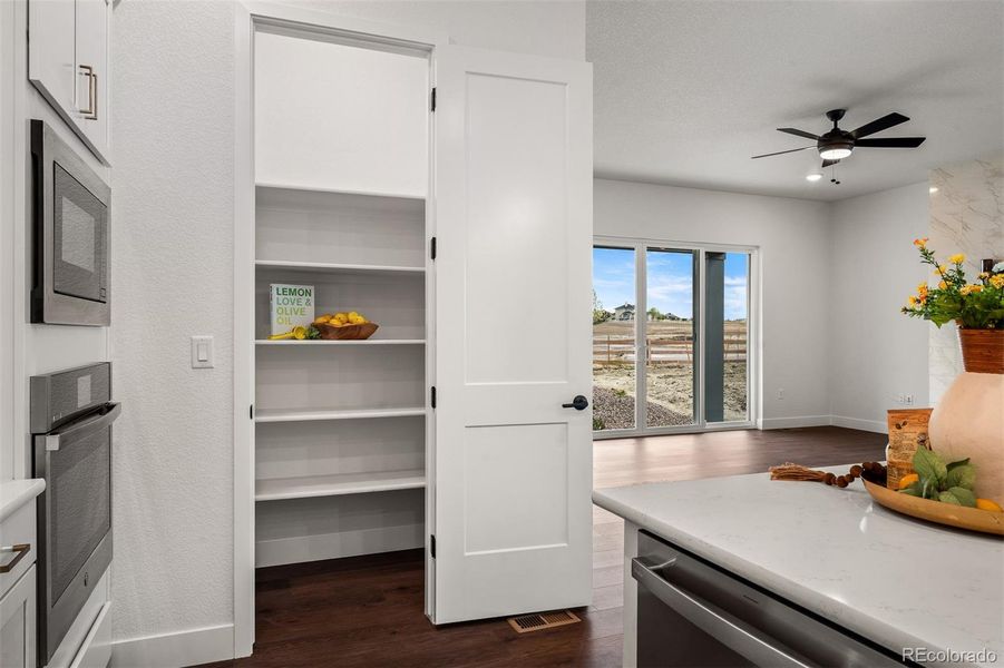 Furnished interior view inside a new home in Wolf Ranch - Enclave Collection, Colorado Springs (Image 5).