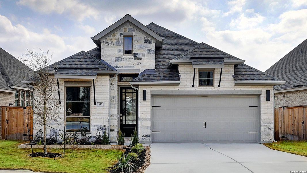 Front exterior of a new home in Arcadia Ridge, San Antonio, TX, highlighting curb appeal (Image 2).