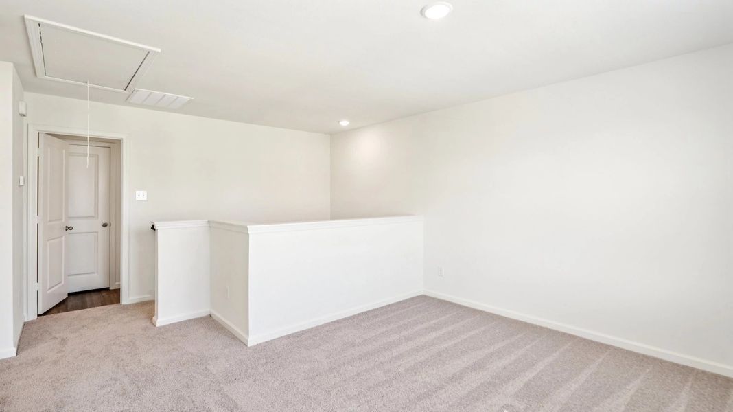 Representative unfurnished interior of a home built from the Jupiter by Starlight Homes in Brookshire at Legacy Hills, Celina (Image 16).