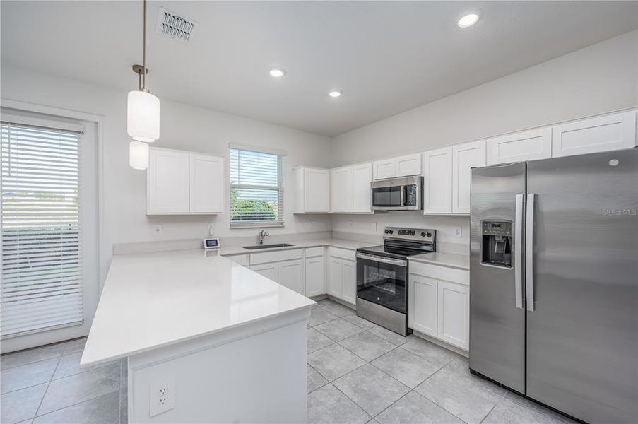 Furnished interior view inside a new home in , Davenport (Image 8).