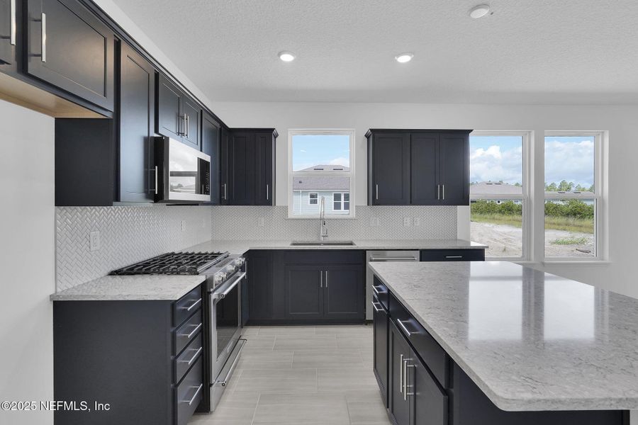 Furnished interior view inside a new home in Del Webb Wildlight, Yulee (Image 9).