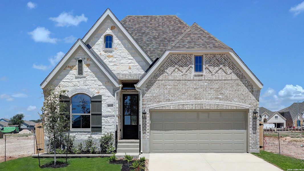 Front exterior of a new home in Kallison Ranch, San Antonio, TX, highlighting curb appeal (Image 2).