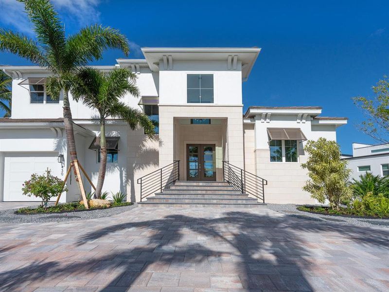 Front exterior of a new home in , Sarasota, FL, highlighting curb appeal (Image 27).