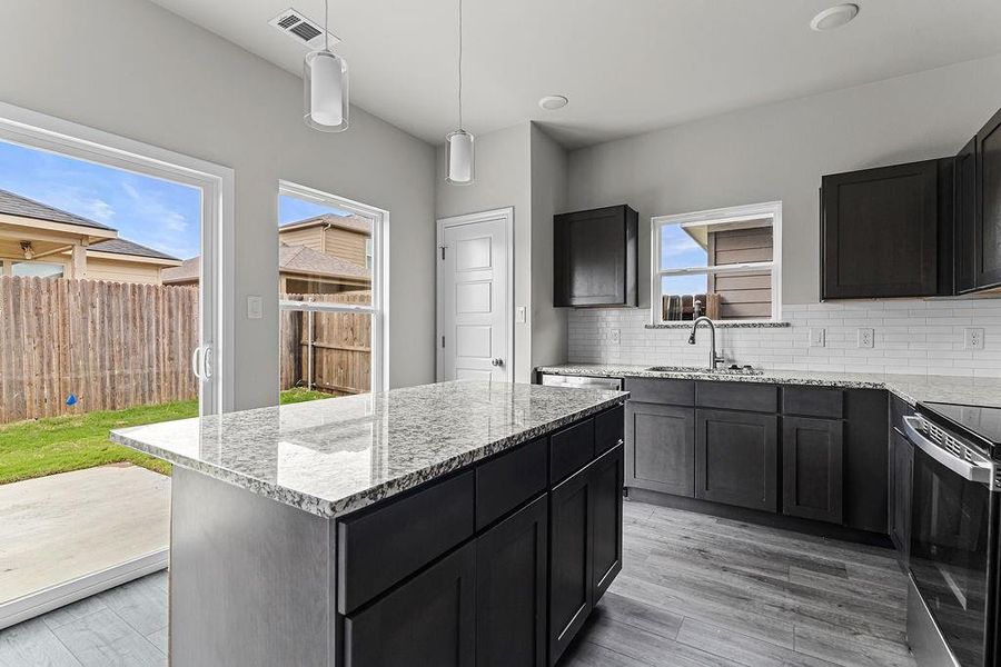 Furnished interior view inside a new home in Trails of Fossil Creek, Fort Worth (Image 9).