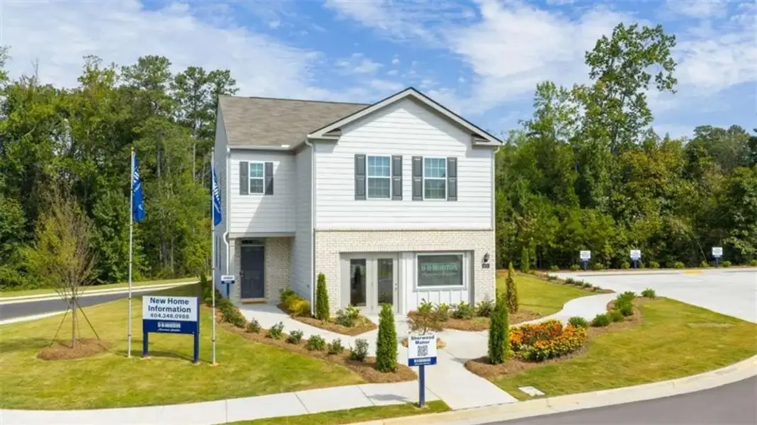 Front exterior of a new home in The Village at Sandy Plains, Marietta, GA, highlighting curb appeal (Image 2). Front exterior of a new home in The Village at Sandy Plains, Marietta, GA, highlighting curb appeal (Image 2).