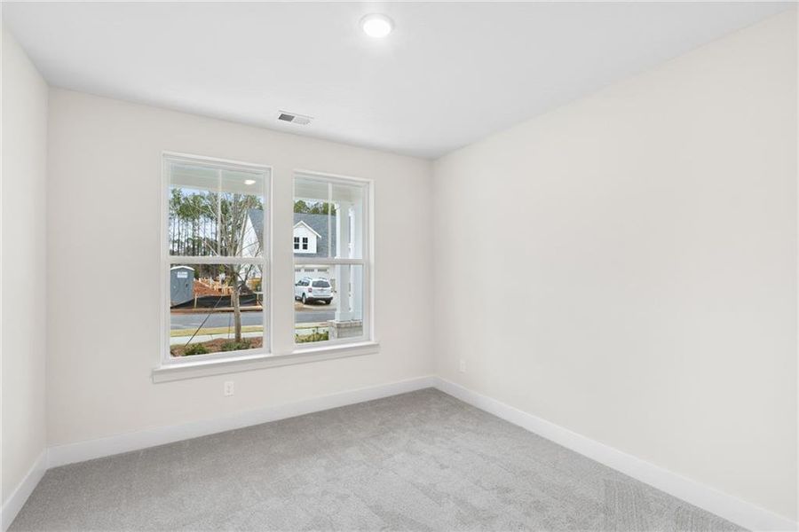 Spacious, unfurnished interior of a new home in Maple Grove at Towne Lake, Woodstock (Image 12).