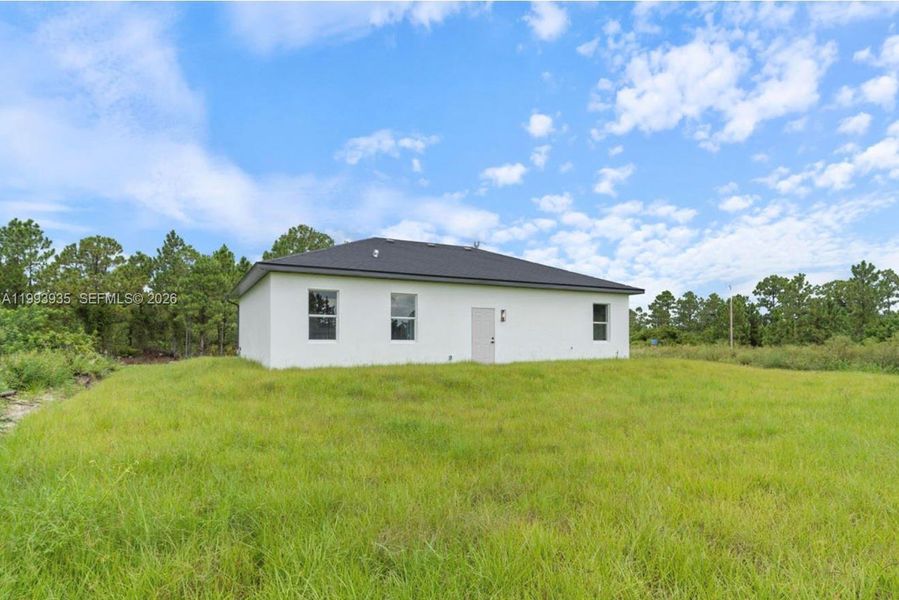 Exterior details and patio area of a home in , Lehigh Acres (Image 25).