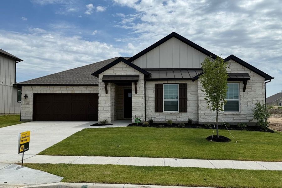 Front exterior of a new home in Sierra Vista at Kelly Ranch, Aledo, TX, highlighting curb appeal (Image 1).