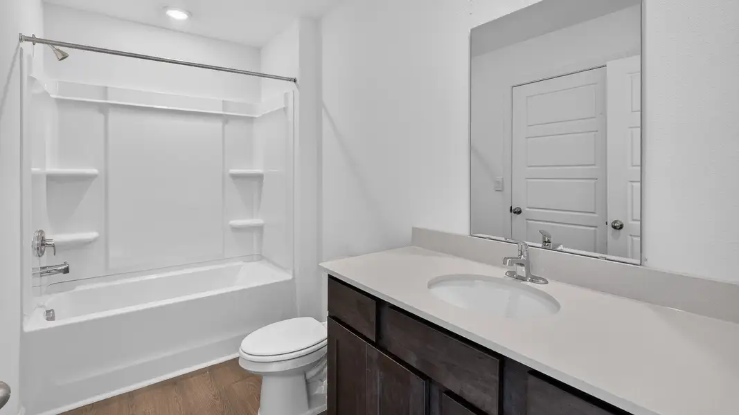 Representative furnished interior of a home built from the Weston by D.R. Horton in Bridle Creek Townhomes, Jacksonville (Image 11).