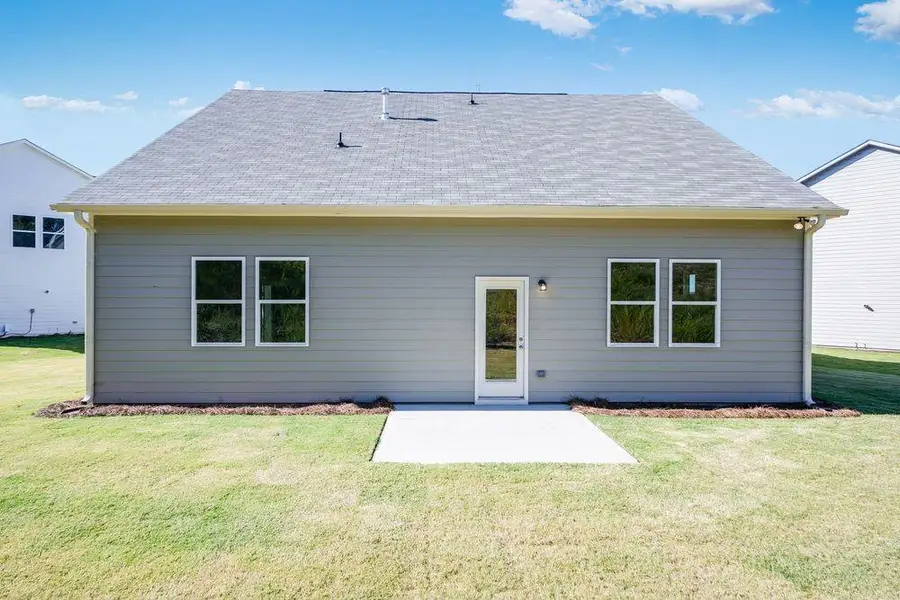 Exterior details and patio area of a home in Heritage River, Euharlee (Image 3).