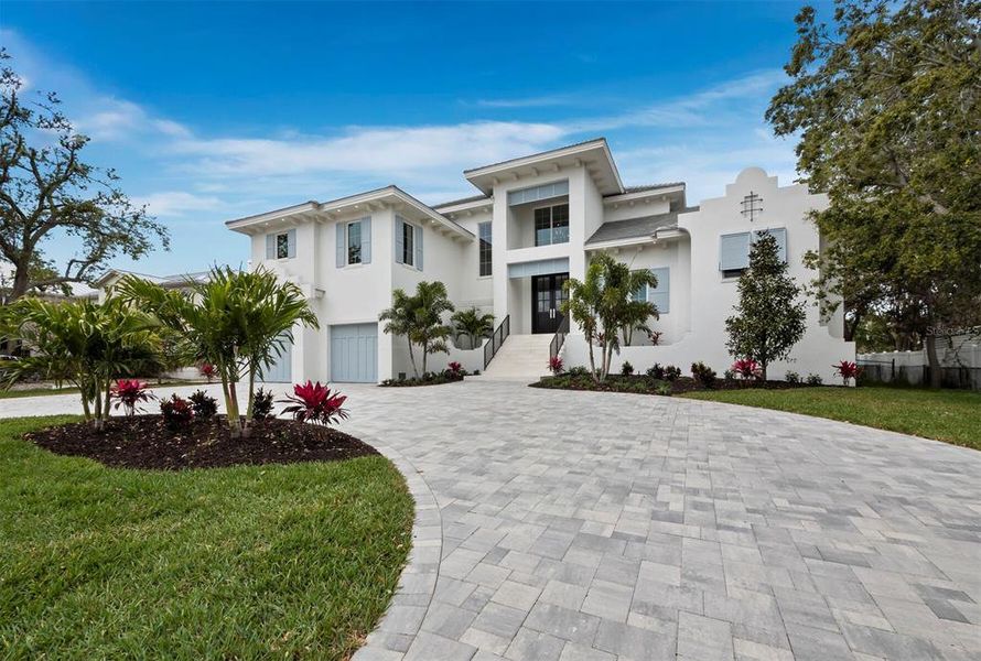 Front exterior of a new home in , Sarasota, FL, highlighting curb appeal (Image 25).