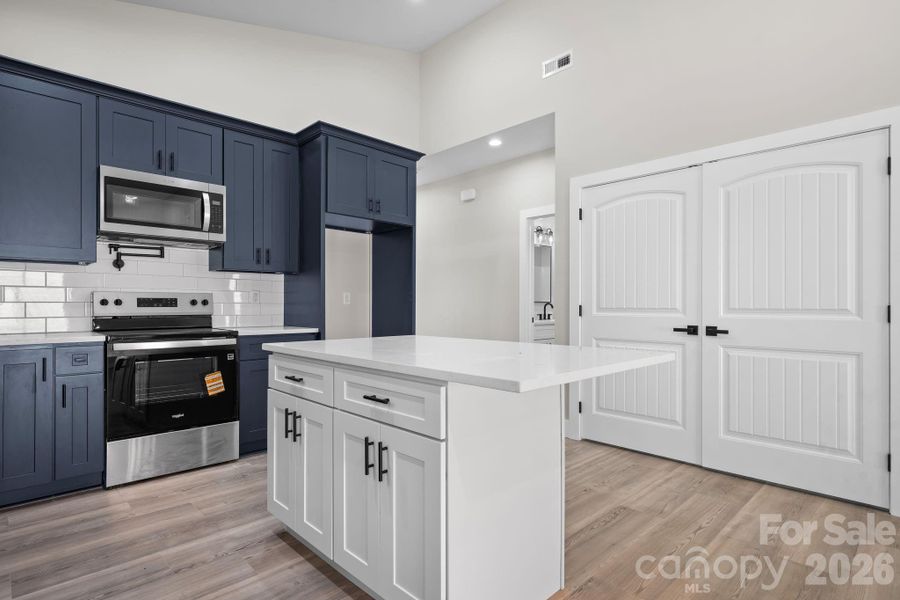 Furnished interior view inside a new home in , Lenoir (Image 10).