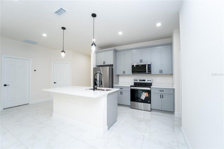 Furnished interior view inside a new home in , Deland (Image 2).