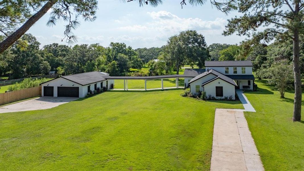 Versatile Family Home With Endless Possibilities. The detached garage includes 2 climate controlled rooms with their own HVAC system which can be used for home office, hobbies, man cave or workshop. Sub-panel for garage structure with extra room for future projects.