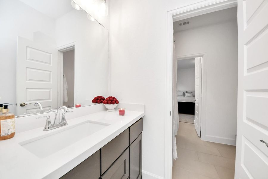 Conveniently located bathroom serving secondary bedrooms.