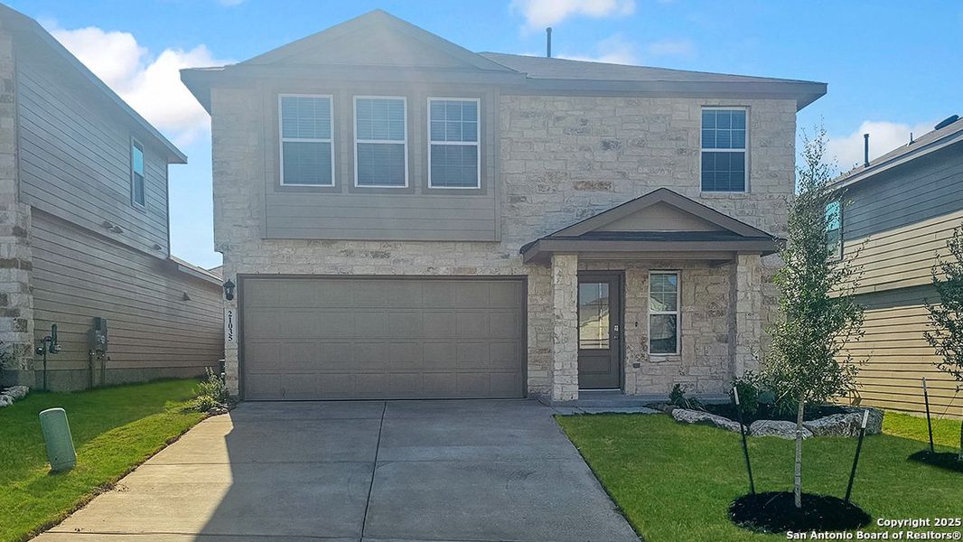 Front exterior of a new home in Brookstone Creek, San Antonio, TX, highlighting curb appeal (Image 1).