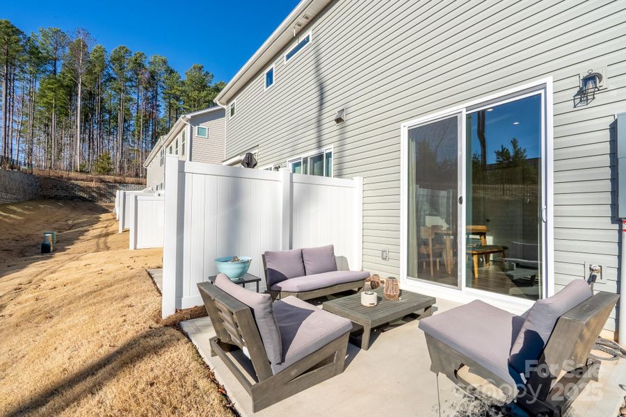 Exterior details and patio area of a home in Somerset, Fort Mill (Image 27).