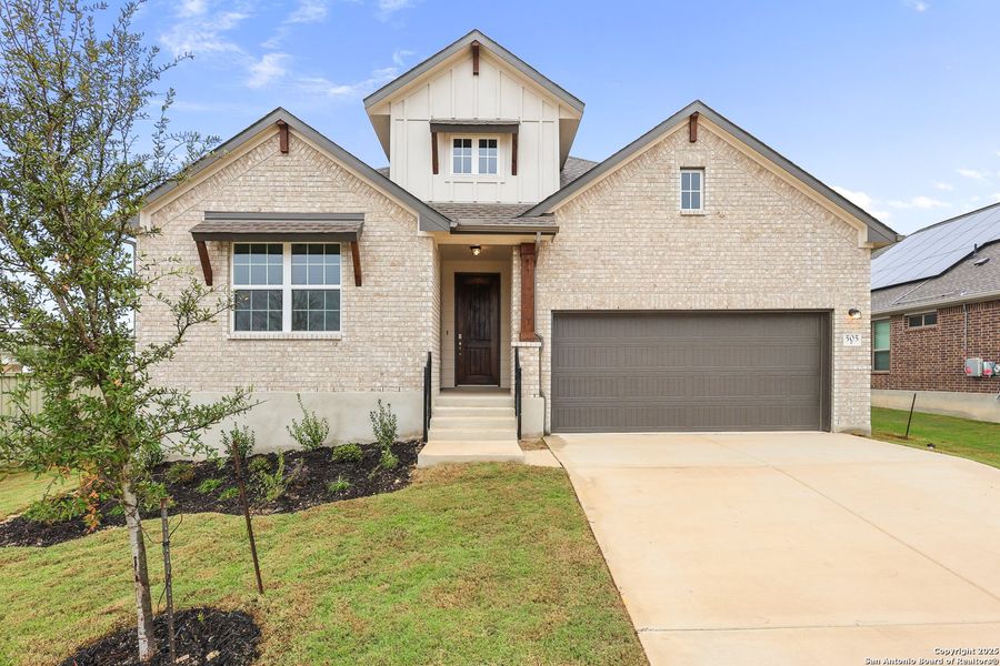 Front exterior of a new home in Foxbrook, Cibolo, TX, highlighting curb appeal (Image 23). Front exterior of a new home in Foxbrook, Cibolo, TX, highlighting curb appeal (Image 23).