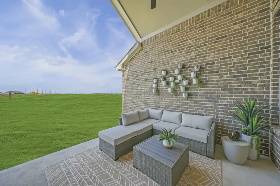 Representative exterior details of a home built from the Bradford by Chesmar Homes in Meridiana 50's, Manvel (Image 4).