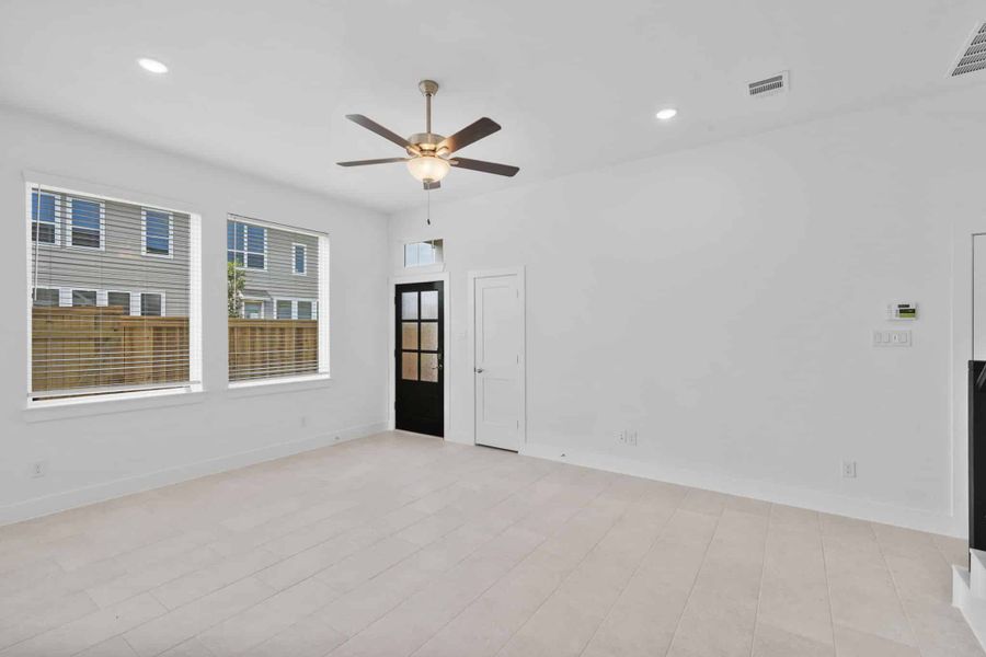 Spacious, unfurnished interior of a new home in Bridgeland, Cypress (Image 14).
