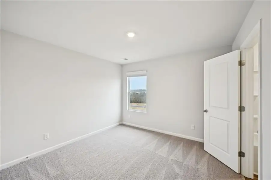 Spacious, unfurnished interior of a new home in The Hills at Cedar Creek, Winder (Image 47).