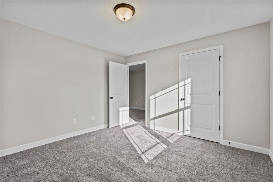 Representative unfurnished interior of a home built from the Iris by Enchanted Homes in Hampshire Heights, Moore (Image 13).