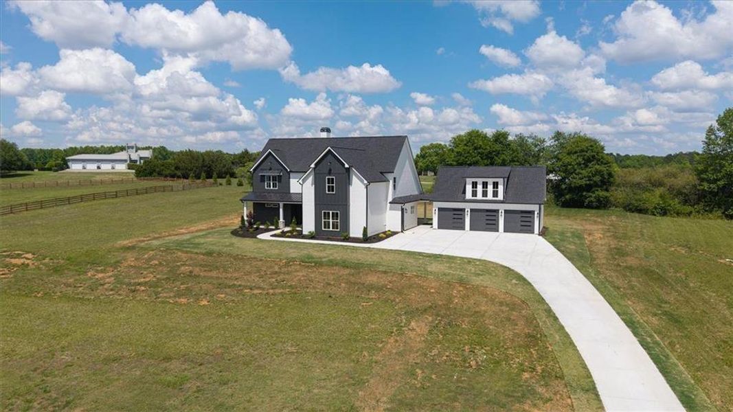 Front exterior of a new home in , Carrollton, GA, highlighting curb appeal (Image 29).