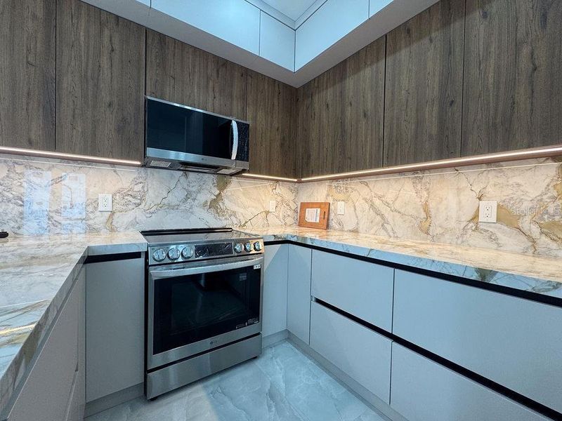 Furnished interior view inside a new home in , Port Charlotte (Image 11).