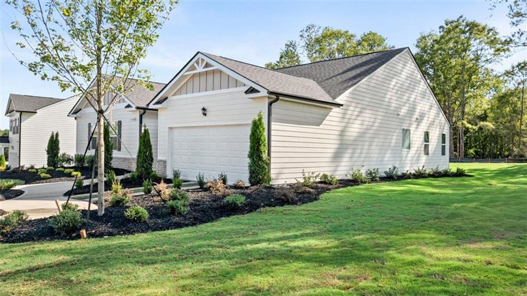 Front exterior of a new home in Jackson Landing, Jefferson, GA, highlighting curb appeal (Image 23).