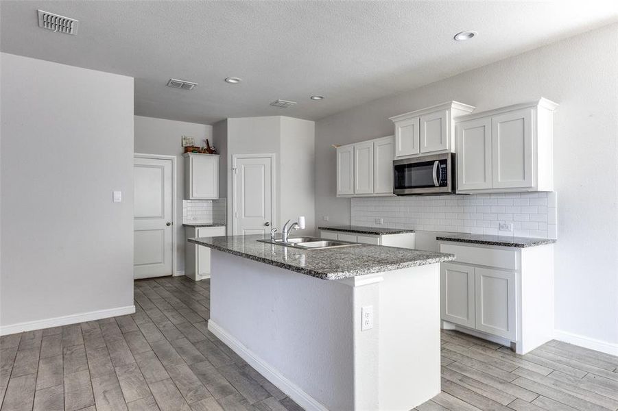 Furnished interior view inside a new home in Springhill South, Boyd (Image 5). Furnished interior view inside a new home in Springhill South, Boyd (Image 5).