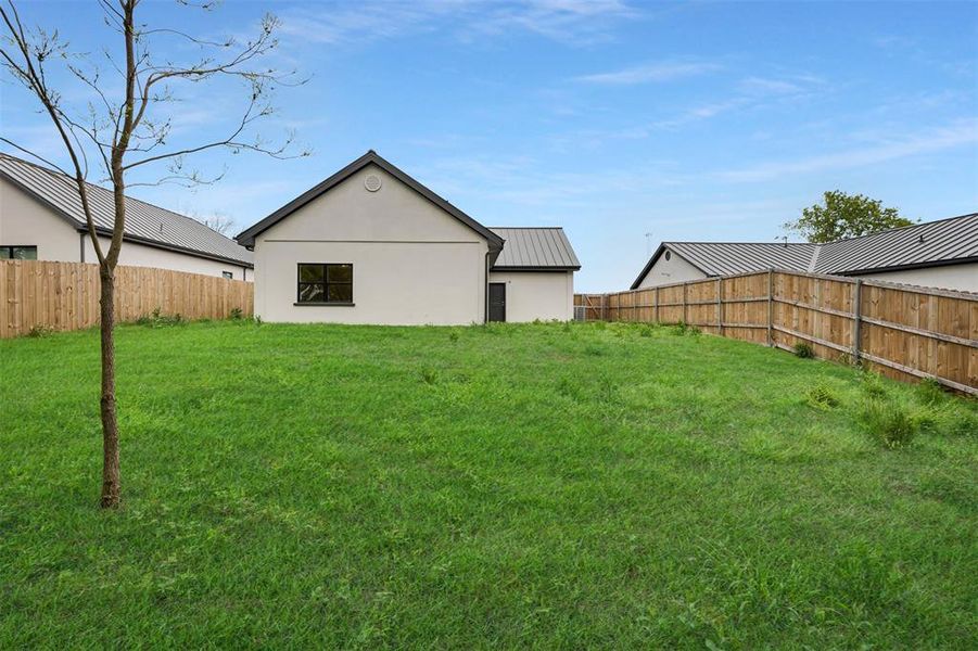 View of yard featuring a fenced backyard View of yard featuring a fenced backyard