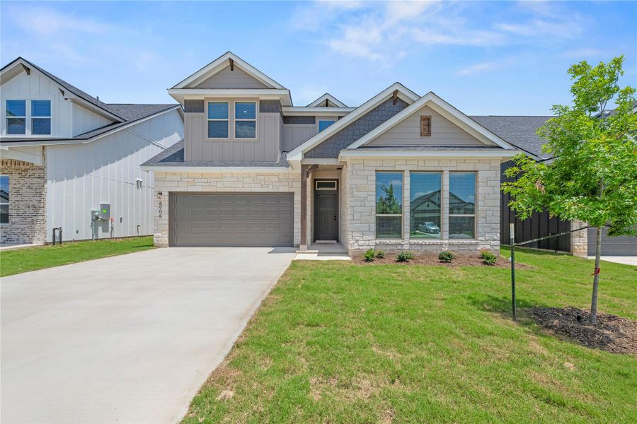 Please Note: These exterior photos are not of the actual home but are of a completed one with a similar floor plan. Finishes, features, and layouts may vary. Please Note: These exterior photos are not of the actual home but are of a completed one with a similar floor plan. Finishes, features, and layouts may vary.