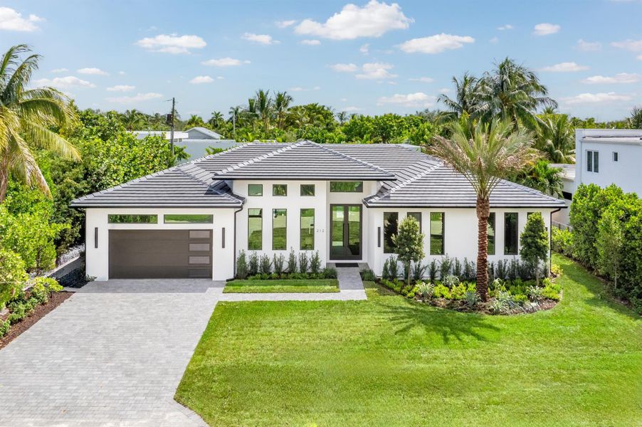 Front exterior of a new home in , Delray Beach, FL, highlighting curb appeal (Image 24).