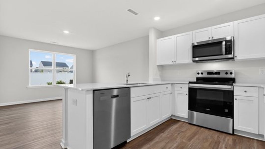 Furnished interior view inside a new home in The Townes at Belle Grove, Wendell (Image 6).