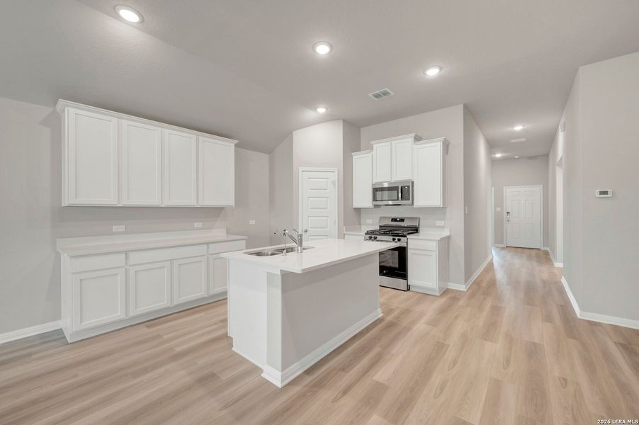 Furnished interior view inside a new home in Mesquite Ridge, San Antonio (Image 7).
