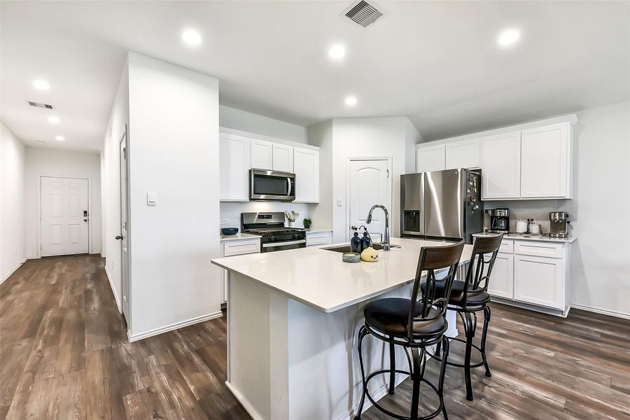 Furnished interior view inside a new home in Sunterra, Katy (Image 15).
