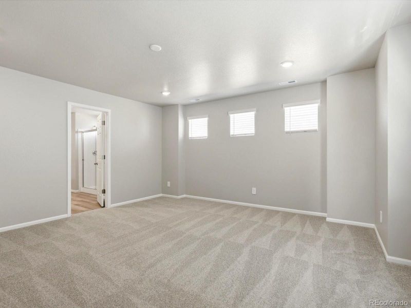 Spacious, unfurnished interior of a new home in Buffalo Highlands: The Flora Collection, Commerce City (Image 30).
