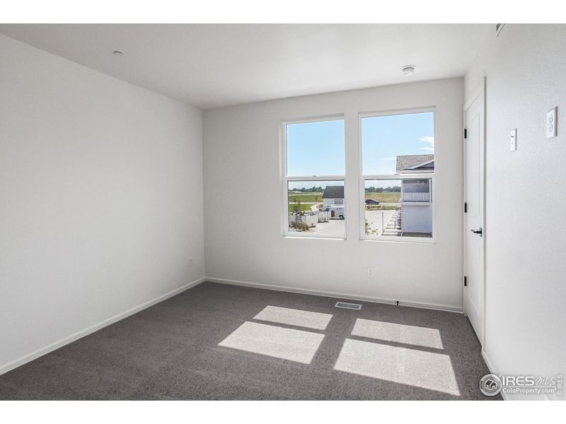 Spacious, unfurnished interior of a new home in Bloom Trailblazer Collection - Single Family Homes, Fort Collins (Image 21).