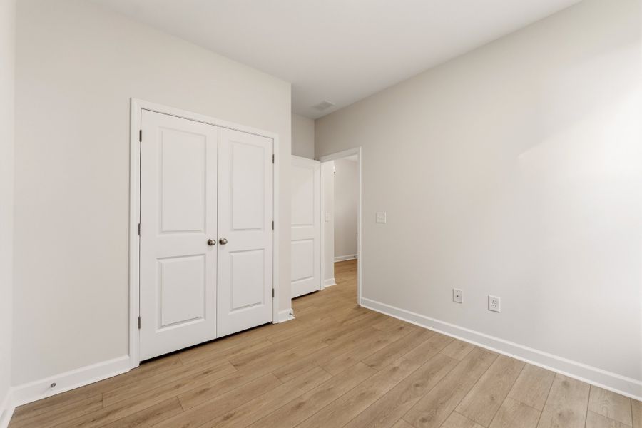 Spacious, unfurnished interior of a new home in Cottages at Lake Emory, Inman (Image 29). Spacious, unfurnished interior of a new home in Cottages at Lake Emory, Inman (Image 29).