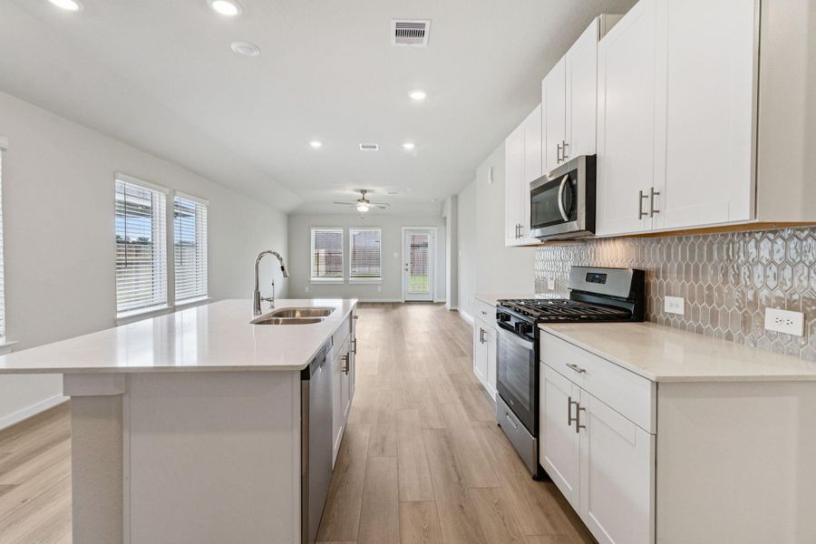 Furnished interior view inside a new home in Landing Meadows - Traditional Series, New Caney (Image 12). Furnished interior view inside a new home in Landing Meadows - Traditional Series, New Caney (Image 12).