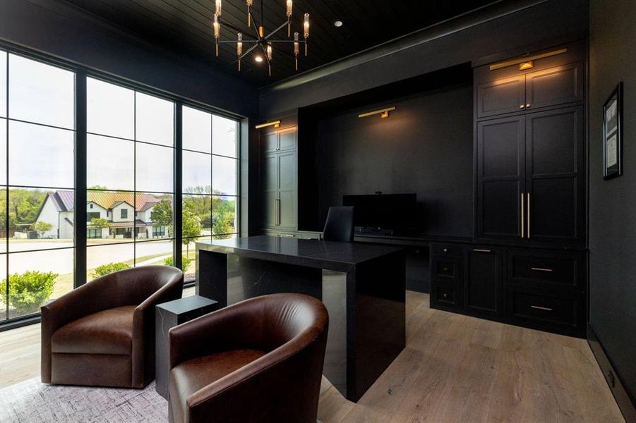 This sleek and stylish office provides ample space and storage to work from home or host meetings.