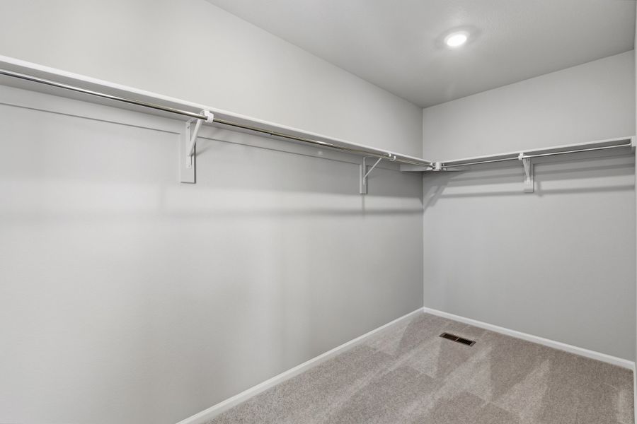 Spacious, unfurnished interior of a new home in Woodrose at Painted Prairie, Aurora (Image 15).