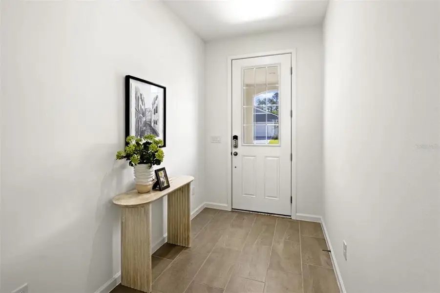 Furnished interior view inside a new home in Rainwood, Groveland (Image 8).