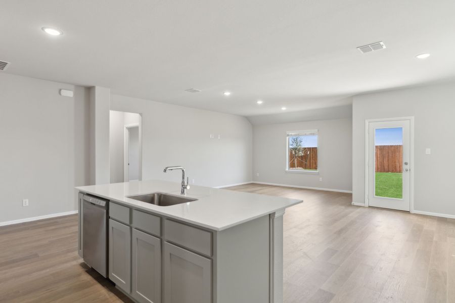 Kitchen in the Harrison home plan by Trophy Signature Homes – REPRESENTATIVE PHOTO Kitchen in the Harrison home plan by Trophy Signature Homes – REPRESENTATIVE PHOTO