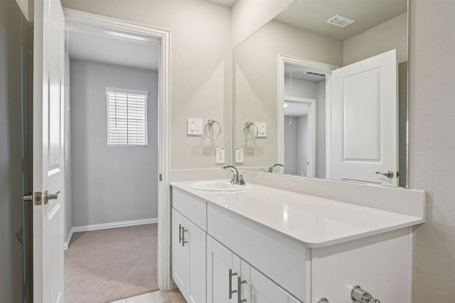 Furnished interior view inside a new home in Parks at Foster Crossing - Signature Series, Anna (Image 13).