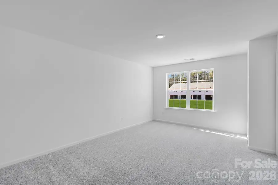 Spacious, unfurnished interior of a new home in Cannon Village, York (Image 11).