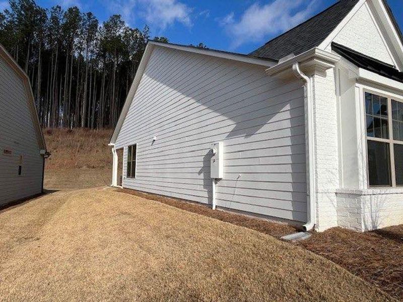 Exterior details and patio area of a home in Soleil Belmont Park, Canton (Image 3).