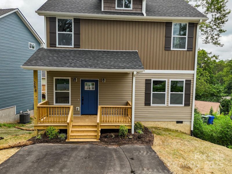 Front exterior of a new home in , Asheville, NC, highlighting curb appeal (Image 23).