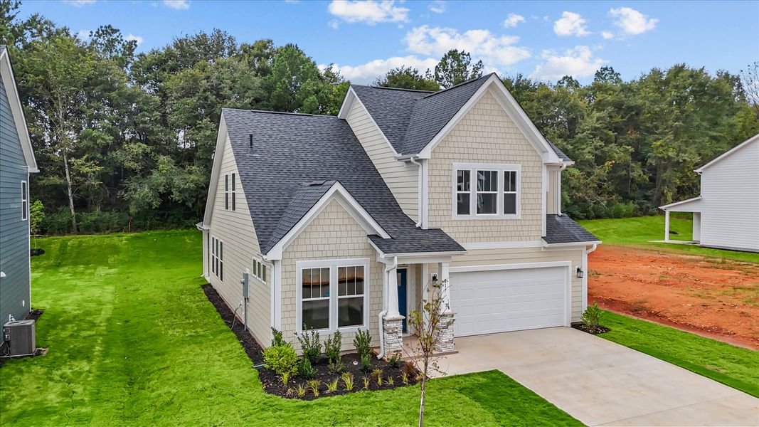 Eye-catching exterior and tasteful interior upgrades in a prime location