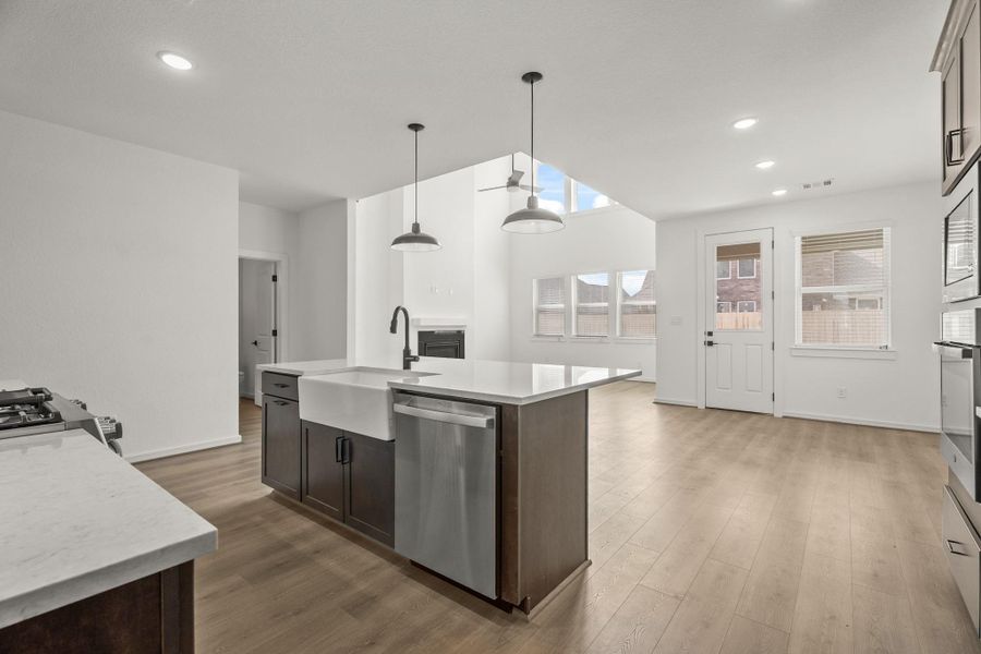 Kitchen open to the great room and dining area Kitchen open to the great room and dining area